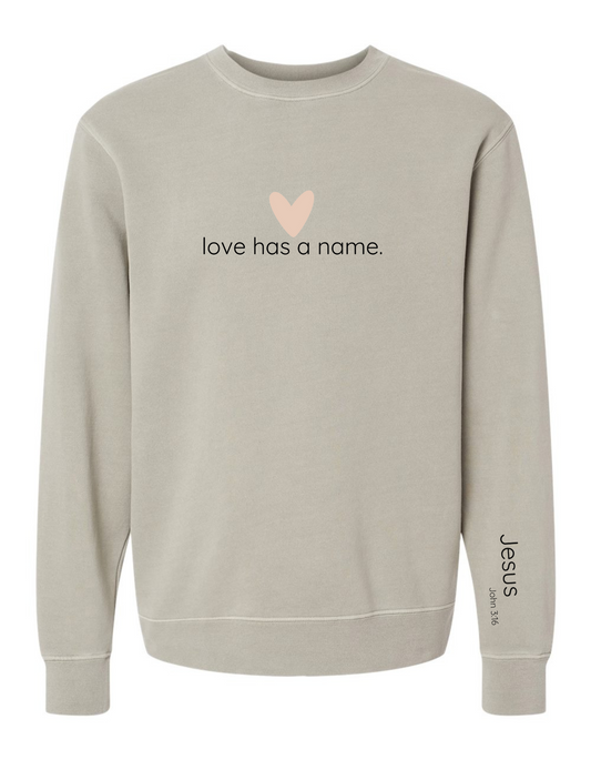 Love Has a Name John 3:16 Crewneck with print on the inner wrist